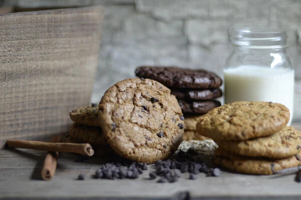 Assorted Cookies with jar of milk